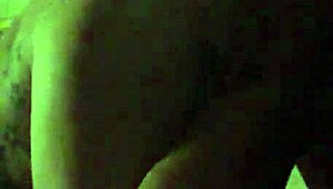 In this retro blue film, a tattooed performer engages in intense riding