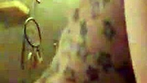 In this retro blue film, a tattooed performer engages in intense riding