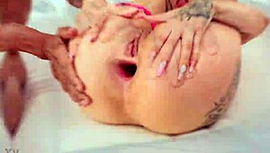 Jazmine White takes real strong double penetration, gaping her pussy.