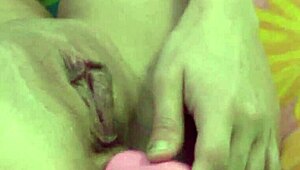 Blonde milf Jen teases her ass with a wild toy