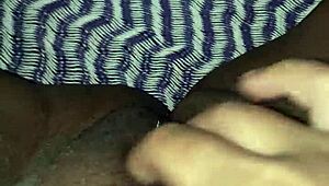 Brunette woman relaxing and touching herself gently