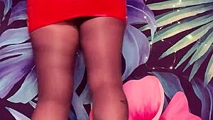 Tease in Pantyhose and Latex Dress