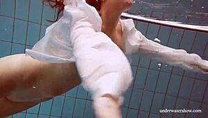 big tits redhead lola swimming nude underwater in pool