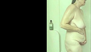 hot milf mommavee takes a steamy shower showing off her big natural tits