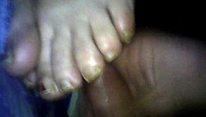 BBW wife gives footjob leading to cumshot
