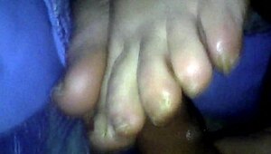 BBW wife gives footjob leading to cumshot