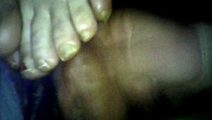 BBW wife gives footjob leading to cumshot