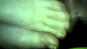 BBW wife gives footjob leading to cumshot