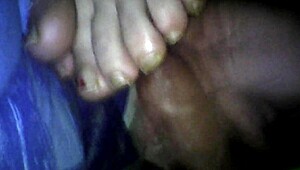 BBW wife gives footjob leading to cumshot