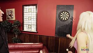 gal loses a darts game and ends up screwing the winner on the sofa.