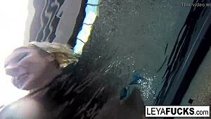 Leya and Lynn indulge in a lesbian romp by the pool