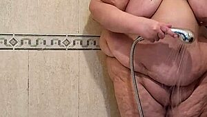 Intriguing mature woman pees and gets fucked by her dildo