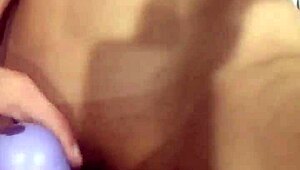 big purple dildo in a tight wet pussy.