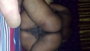 A wife pretends to be a professional in an intimate homemade encounter with her partner.