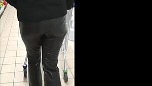 wife shops in leather trousers outdoors 📱
