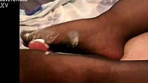 Yo, check this pantyhose footjob action! 😍