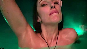 perfect brunette enjoys a relaxing outdoor bath