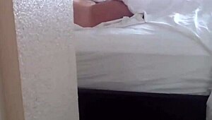 Peeping on a milf in her hotel room