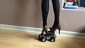 toy car gets crushed under high heels