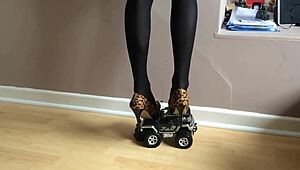 toy car gets crushed under high heels