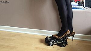 toy car gets crushed under high heels