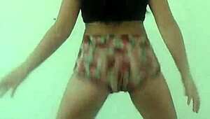Teen dances Brazilian funk style.