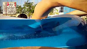 Nude lady hairdresser strips client in barbershop.