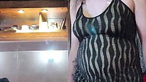 Naughty brunette shemale models dresses in a solo session for part 5.