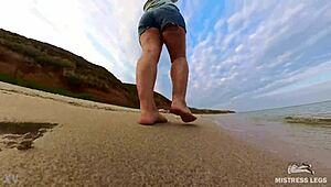 Follow wrinkled feet on sandy beach