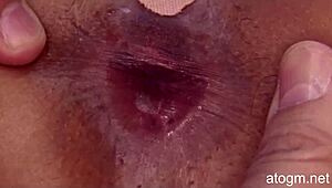 wow, this uncensored Japanese girl gets her tight asshole fingered up close in hot Asian anal action!