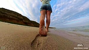 Follow wrinkled feet on sandy beach