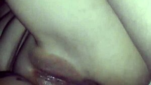 She's just sitting there, fingering her pussy like it's no big deal.