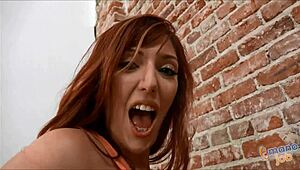 Lauren Phillips Teases with a Fiery Ginger Handjob in Wild Action