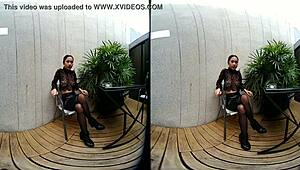 young girl smokes topless in leather skirt