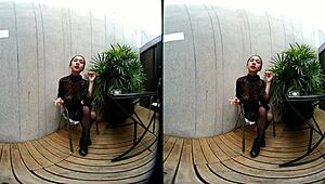 young girl smokes topless in leather skirt