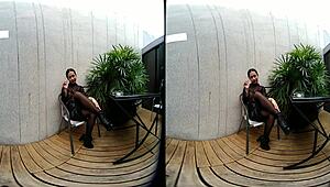 young girl smokes topless in leather skirt