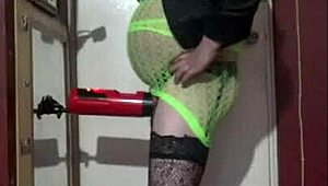 Crossdresser indulges in wild machine masturbation at home.