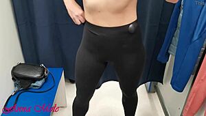 A Girl with Perfect Figure and Lovely Small Breasts Tries Sports Leggings in Fitting Room
