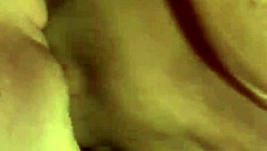Licking her wet pussy on the dining table – cum dripping out.