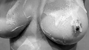 Girlfriend caught showing off her wet tits and pussy in the bath