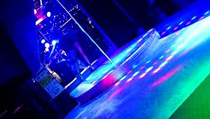 stripper teases the crowd at eds bar on titty tuesday in grafenwoehr.