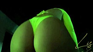 latina babe dances in panties, showing off her natural tits on webcam.