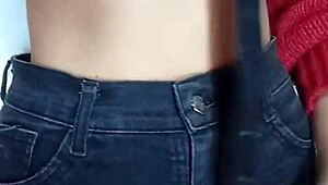 Playing with a belt, spanking my natural tits hard.