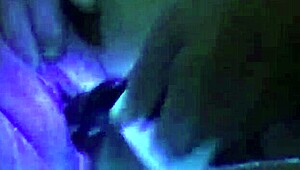 Shaved pussy glows in the dark during dildo toy play full video