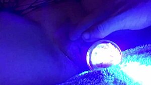 Shaved pussy glows in the dark during dildo toy play full video