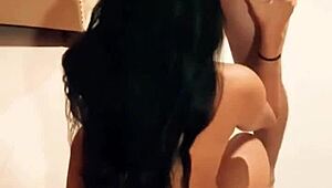 My wife sits holding my cock