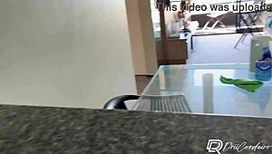 Naughty employee passionately fucks her boss on the kitchen sink