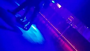 Go-Go Dancer Pulls Married Brunette Onto Dance Floor, Lifting Her Dress