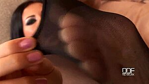 Why Are Lora's Black Stocking Legs So Tempting?