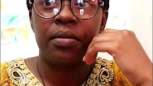 the black mama lounged on the sofa, her ebony pussy ready for amateur sex with the slutty milf vibe.